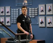 John Nolan (Nathan Fillion)