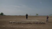 RAKHINE STATE, MYANMAR -Sam and Robert Joe examine old foundations near the site of an airstrip that was used by the Allies to recapture Rangoon, modern-day Yangon.