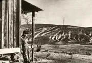 Severely eroded farmland during the Dust Bowl, circa 1930's