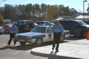 Police officers arrive at the scene of the robbery.