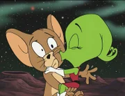 Die Marsianer (re.) sehen in Mäuserich Jerry (li.) einen edlen Marsianer aus einer Legende und so erlangt Jerry Heldenstatus auf dem Mars. Doch dann wendet sich das Blatt für den Mäuserich...