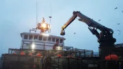 POV on the Time Bandit deck. Deckhand ontop of the stack.