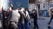 Police arresting suspects