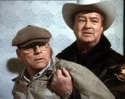 Sheriff Metzger (Ron Masak) nimmt den unter Mordverdacht stehenden Ben Oliver (Gerald S. OÁLaughlin) fest.