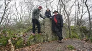 BAD MUNSTEREIFEL, GERMANY -Sam Willis and Robert Joe meet Harald Bongart, a local guide and historian in Bad Münstereifel, Germany. Harald Bongart tells them that the site they stand on is called the Felsennest and was once Adolf Hitler’s headquarters during World War II where Hitler orchestrated the attack of Fort Eben Emael in 1940.  (photo credit: Fox International Channels Singapore/Lau Hon Meng )