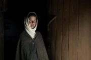 English villager at her doorway. (Dash Pictures/Adam Jandrup)