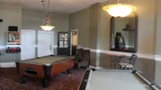 Billiards room before, as seen on Travel Channel's Hotel Impossible.