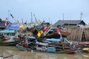 Traditional fishing boats are seen damaged after being hit by a tsunami in Banten, Indonesia on December 26, 2018. Fishery industry was damaged by the Tsunami disaster as fishers can not conduct and fishing activities. Traditional fishing boats are seen damaged after being hit by a tsunami in Banten, Indonesia on December 26, 2018. Fishery industry was damaged by the Tsunami disaster as fishers can not conduct and fishing activities.