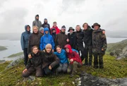 Nicht trocken, aber glücklich. Gruppenfoto beim permanent regnerischen Wetter.