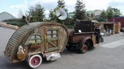 The Cushman pulling a trailer.