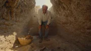 Archaeologist Dr. Sameh Iskander examines a newly discovered tomb near the temple of Abydos in Egypt.