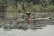 Kaiela sitting on the raft.