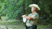 Mike Boone examining a crane for injuries.