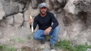 Joe Teti posing with his digging stick.