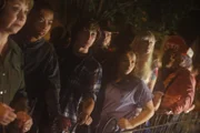 Line of patrons to enter Allen House on Halloween.