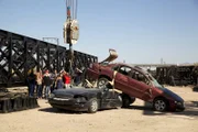 Las Vegas, US: Having tested the stenght of 'hook and loop' with 10 people, Tim now wants to upscale the whole operation. Will it take the combined weight of these two cars?