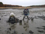 Maine, United States: Andy and Jim Campbell dig for a paycheck.