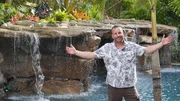 Lucas Congdon poses in front of completed pool.