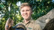 Robert Irwin with snake.