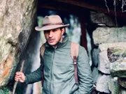 Ramy Romany stands at a tunnel entrance