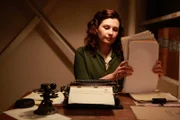 Inge working at her desk.