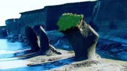 Drei Kunstwerke an einem Strand: Permafrost-Schmelze auf Pelly-Island im arktischen Nord-Kanada