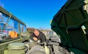 "Steel Buddy" engine expert check the engine.
