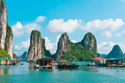 Floating village and rock islands in Halong Bay, Vietnam, Southeast Asia