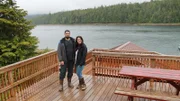 Adam and Autumn Bremer, standing on deck MS, at Gravina Island house, complete with multiple decks, facing water, near Ketchikan, Alaska, as seen on Great American Country's Living Alaska