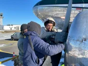 Michael Manousakis (r.) with Douglas DC-3.