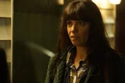 A young woman has a surprised expression.