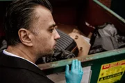 Detective am Tatort.