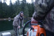 Breana Meithe and Oliver Johnson entering their skiff to go look for firewood in Port Protection.