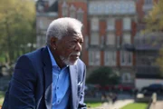 London - Morgan Freeman listening closely to journalist Mabrouka Khedir during their interview at Jewel Tower about Arab Springs.