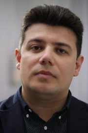 Dmitriy Stepanov, who fled persecution in Russia, when he and his partner immigrated to America.