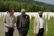 Senad Hadzifejzovic and Fedja Hadzifejzovic give Morgan Freeman a tour Srebrenica Genocide Memorial as he interviews them about the events that led to the genocide.