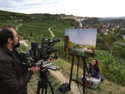 Dreharbeiten für "Terra X": Das Gemälde "Blick vom Isteiner Klotz“ zeigt den Rhein vor seiner Begradigung als wilde Flusslandschaft.