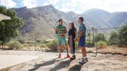 From left to right: host David Bromstad, Marlene Adelman and Kenny Yourist explore backyard of House 1, Tahquitz Rim