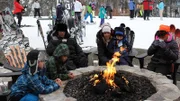 The Valastro family takes a rest by the fire with some hot chocolate.