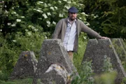 Tony Pollard standing with dragons teeth. The Dragons Teeth were a major feature of the Siegfried Line.