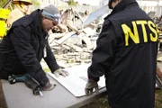 REENACTMENT: Clint Crookshanks (played by Jason Weinberg) and a firefighter navigate through the smouldering wreckage of a Bombardier commercial jet to locate and retrieve the black boxes from the flight, which mysteriously fell from the sky minutes from landing at Buffalo's airport.