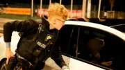 Ep2 - Senior Police Commissioner Victoria Willich during the inspection of a speeder.