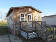 Realtor Jill is excited to show homebuyers, Elaine and Kenny all what this cabin tiny home has to offer. Located in Ravenswood, MO.