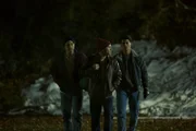 Reconstruction Actor playing Madrowski (Jensen Steele Chambers), actor playing Dean (Chris Jehnert) and Actor playing Robert (Brett Solimine) all walking together in the woods