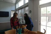 Zoe is with the dog and it's owner.