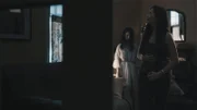 A ghost behind pregnant woman