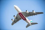 DUBAI AIRPORT, UAE - Emirates aircraft from below.