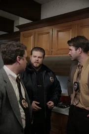 Reconstruction Actor playing Det Rhodes (Brendan Reardon) and Actor playing Det Schnell (Scott Watson) talking to Actor playing PD (Kevin Brodie).