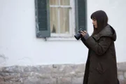 Elizabeth Saint taking photographic evidence of Boydville Manor.