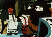 Wickies Mutter und ihr Mann Halvar sind unterschiedlicher Meinung, ob Wickie mit auf Beutezug geht.